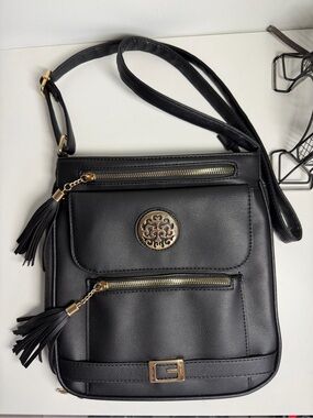 Black Crossbody Bag with Gold-Tone Trim and Tassel Details